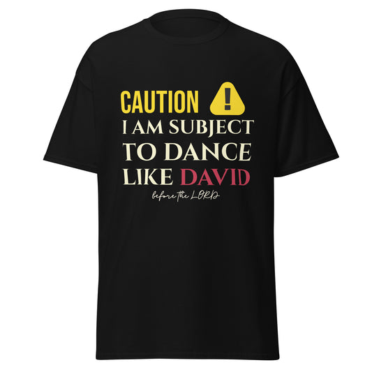 Black t-shirt with yellow and red text that says "caution I am subject to dance like david before the lord."